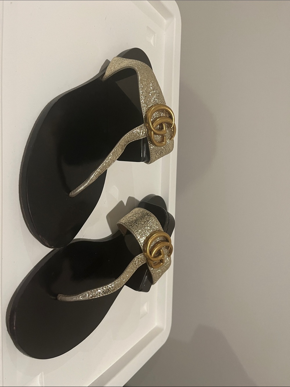 Gucci Black and Gold Metallic Logo Thong Sandals